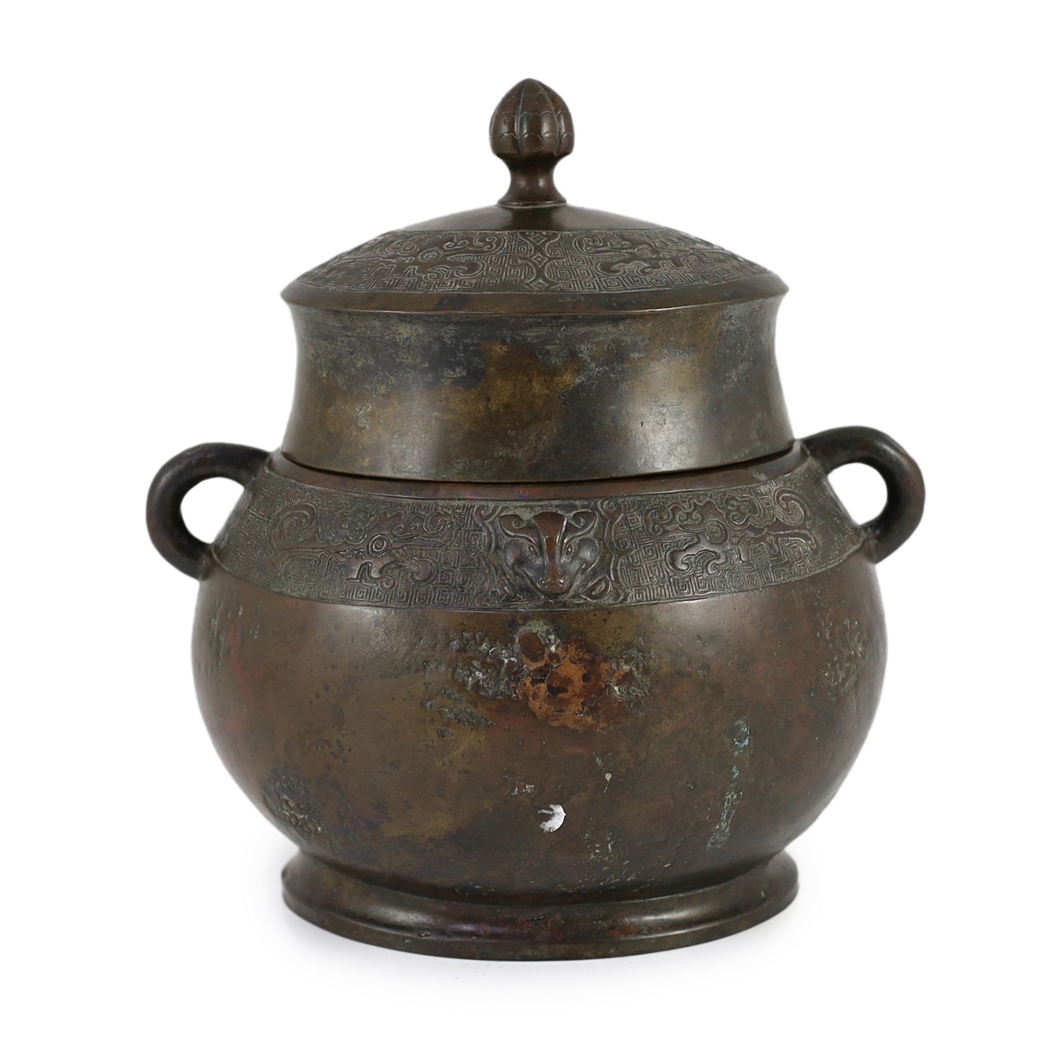 A Chinese Ming bronze jar and cover, hu, 26cm high, old repairs